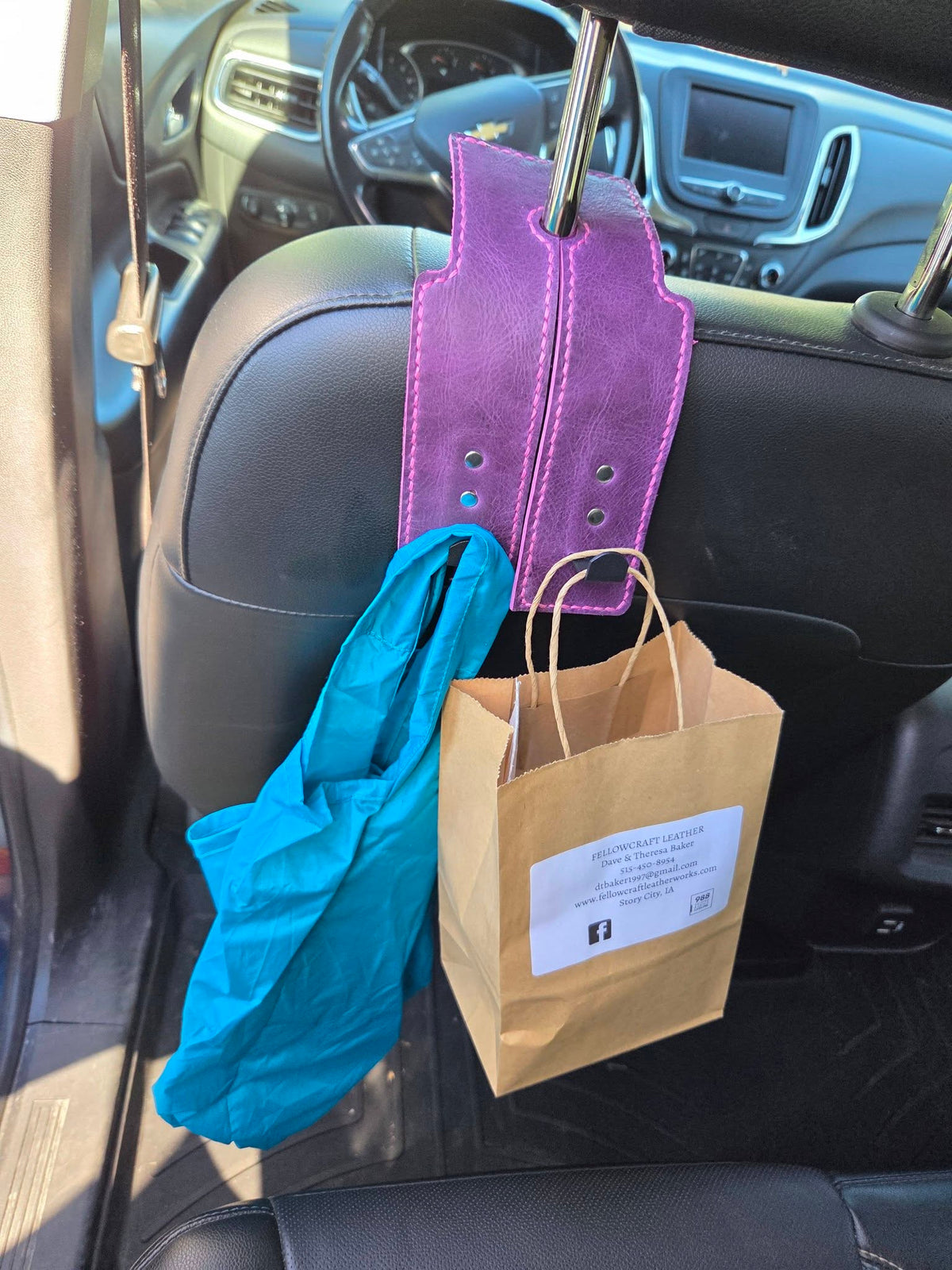 Over headrest bag holder