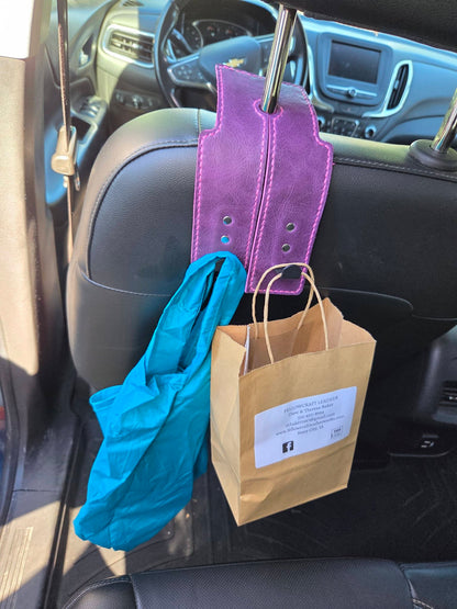 Over headrest bag holder